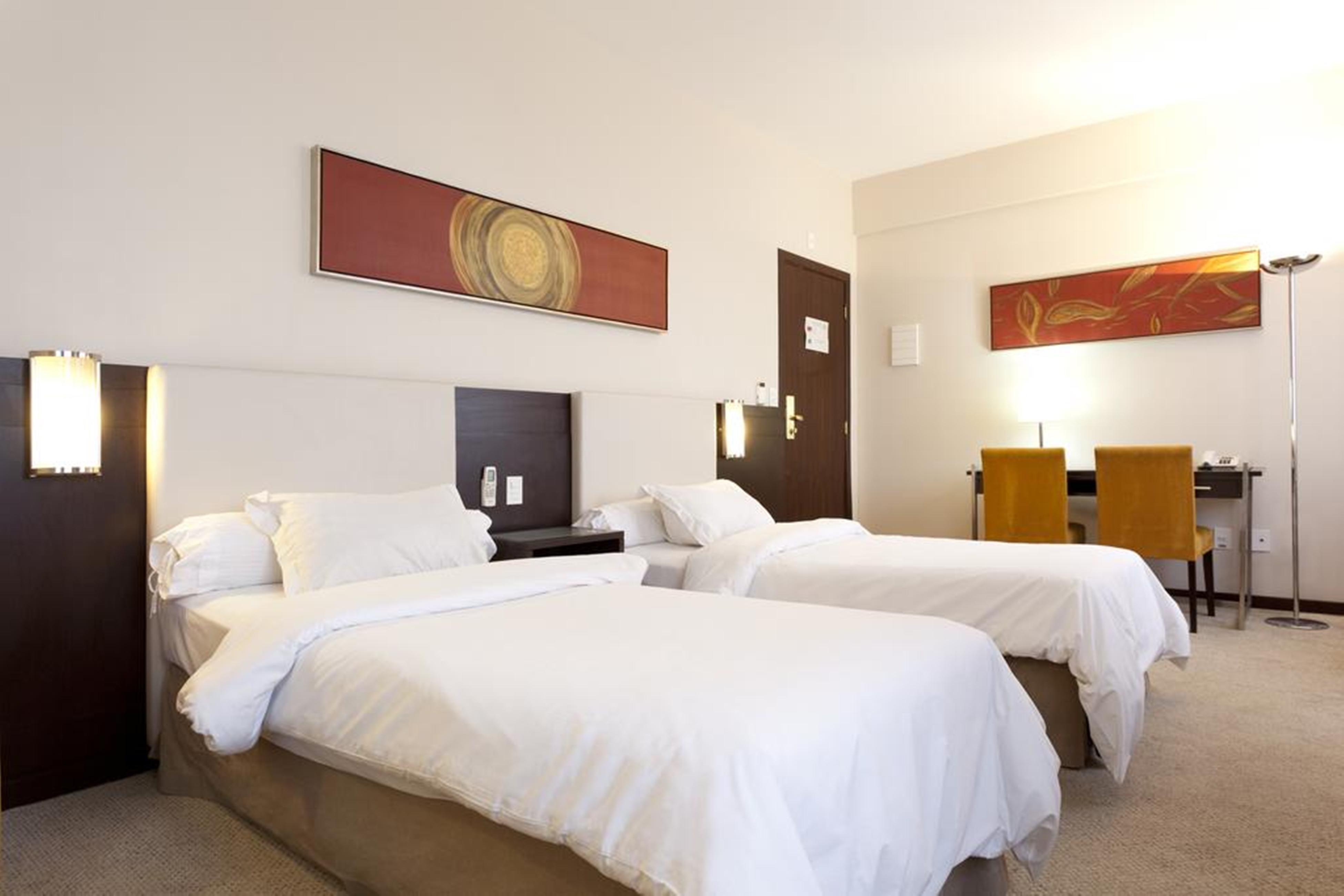 Royal Boutique Savassi Hotel เบโลโอรีซอนชี ภายนอก รูปภาพ A typical room at the hotel