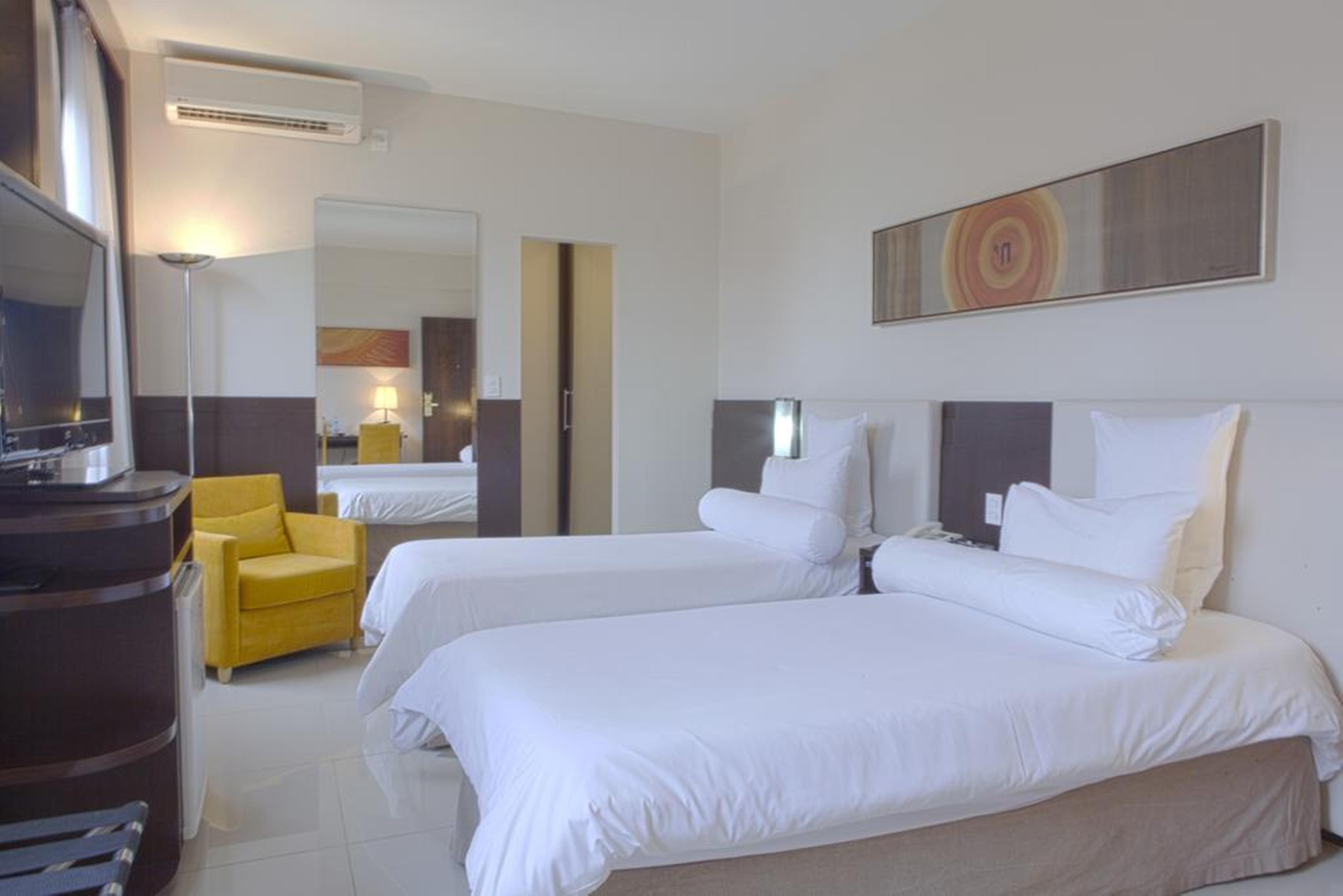 Royal Boutique Savassi Hotel เบโลโอรีซอนชี ภายนอก รูปภาพ A room at the hotel